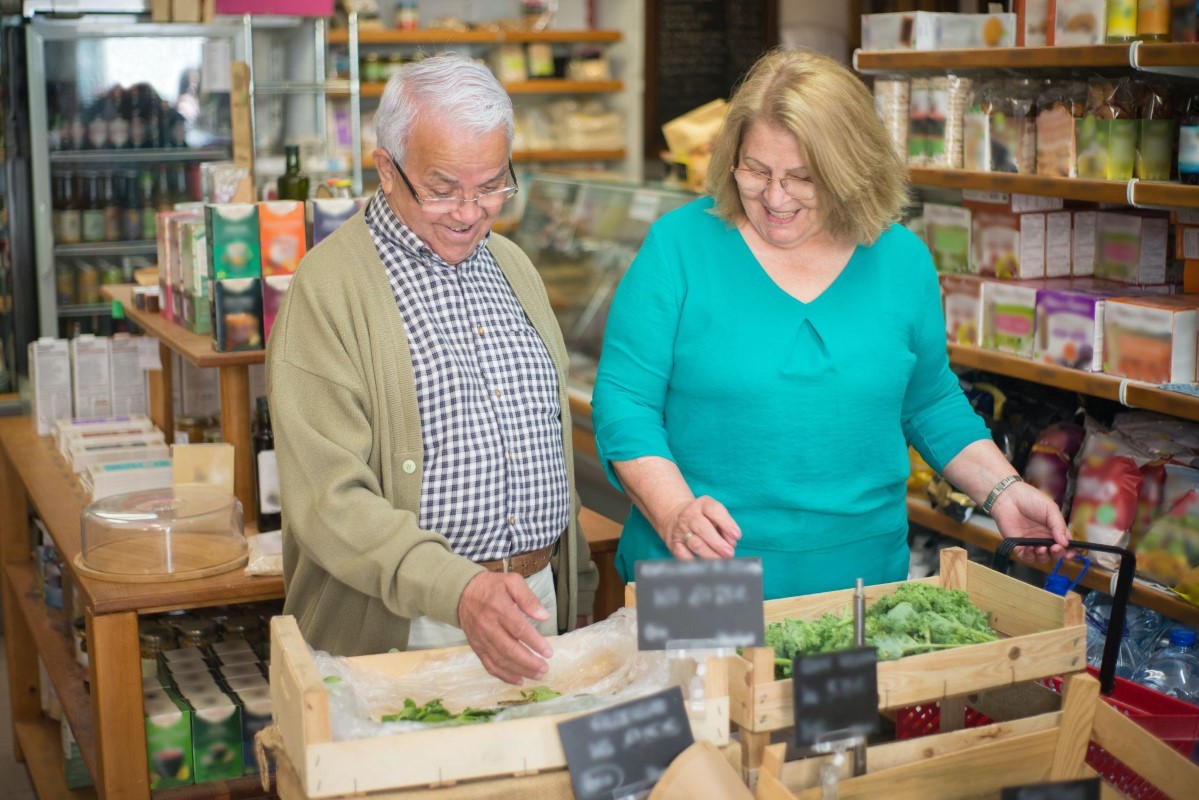 old couple shopping in mall